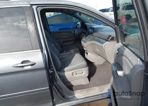 2010 Honda Odyssey Ex-L z USA, uszkodzony, nr VIN 5FNRL3H73AB057149